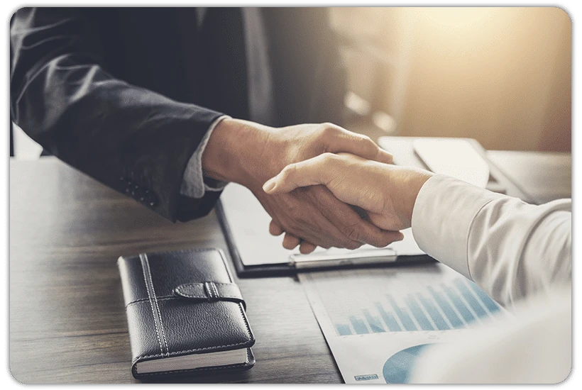 Business handshake representing finding the right partners for successful projects